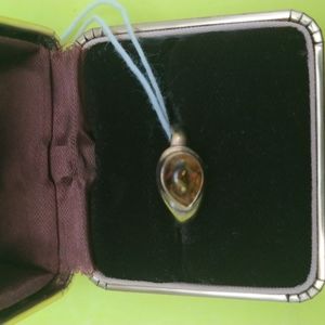 STERLING SILVER LADY'S RING WITH GENUINE AMBER STONE